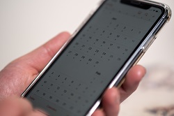 Close up phone of a mobile photo with the calendar app open 