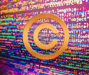 image of computer code with a copyright symbol overlaying it
