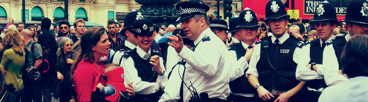 Photo of a crowd with police officers