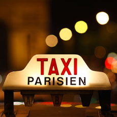 Taxi sign at night