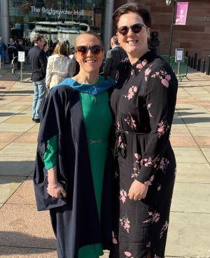 two women smiling 