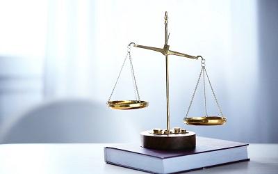 Scales on a desk representing justice