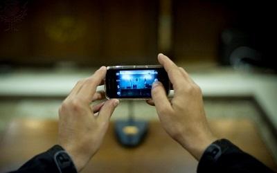 hands holding a mobile phone