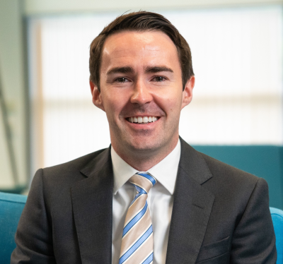 James Boyce, one of the winners of the Open Business Creators Fund, smiling at the camera