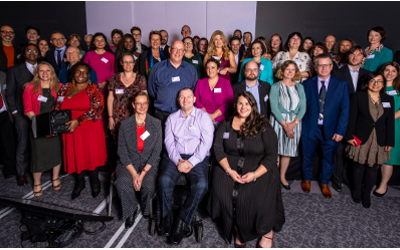 Group photo of the winners sitting and standing