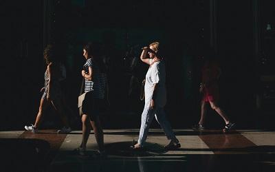 Photo of women walking in Piazza Duomo, Milano, Italy by Simone Viani on Unsplash