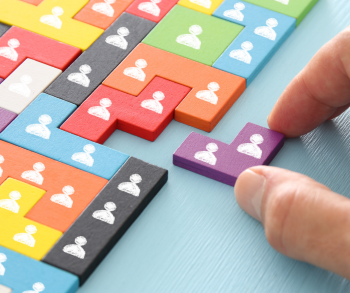 puzzle showing people fitting together