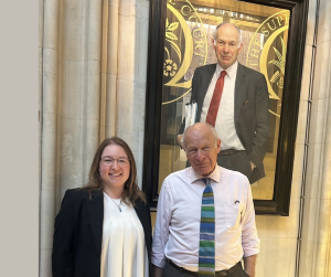 photograph of Charlotte Watts and Lord Neuberger 