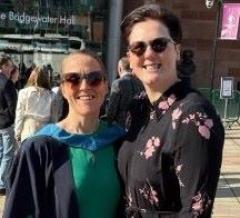 two women smiling 